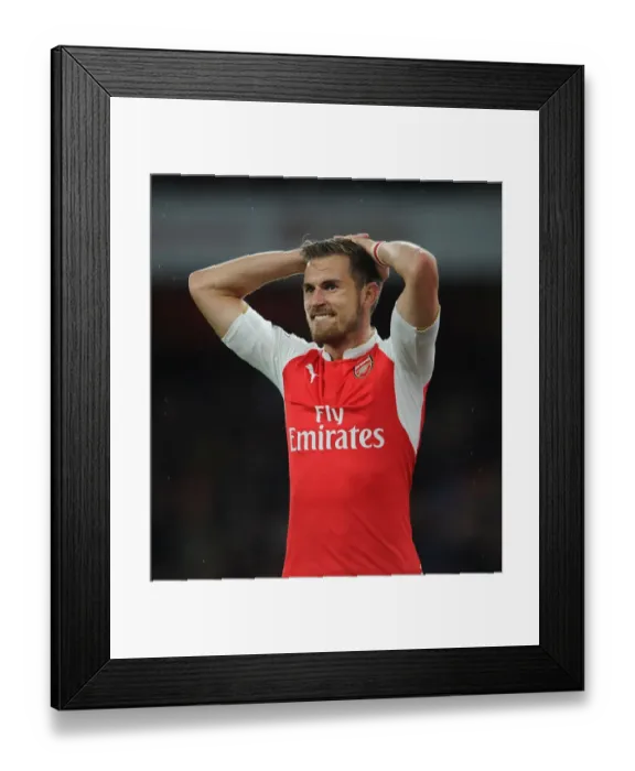 Framed Print : Arsenal's Aaron Ramsey Faces Off Against Liverpool in the 2015 / 16 Premier League Framed Print : Arsenal's Aaron Ramsey Faces Off Against Liverpool in the 2015 / 16 Premier League