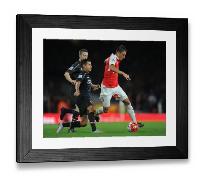 Framed Print : Arsenal's Mesut Ozil Clashes with Liverpool's Coutinho and Rossiter in Intense Arsenal vs Liverpool Premier League Showdown (2015 / 16) Framed Print : Arsenal's Mesut Ozil Clashes with Liverpool's Coutinho and Rossiter in Intense Arsenal vs Liverpool Premier League Showdown (2015 / 16)