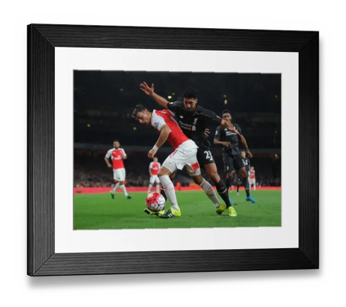 Framed Print : Mesut Ozil vs. Emre Can: A Midfield Duel at the Emirates - Arsenal vs. Liverpool, 2015 / 16 Premier League