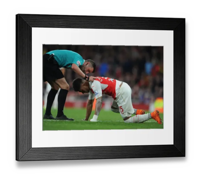 Framed Print : Referee Examines Oxlade-Chamberlain Amid Intense Arsenal vs. Liverpool Clash (2015 / 16)