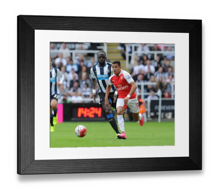 Framed Print : Clash of Titans: Sanchez vs. Sissoko - Arsenal's Alexis Sanchez Goes Head-to-Head with Newcastle's Moussa Sissoko, Premier League 2015-16