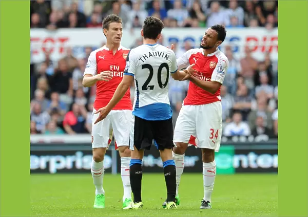 Arsenal's Coquelin and Koscielny in Deep Discussion with Newcastle's Thauvin during 2015-16 Premier League Clash