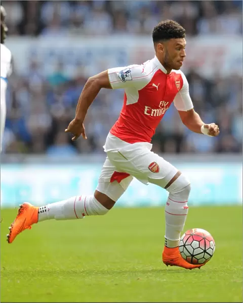 Arsenal's Alex Oxlade-Chamberlain Faces Off Against Newcastle United in Premier League Clash (2015-16)
