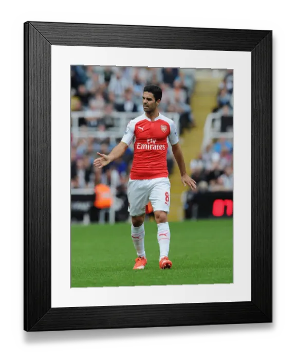 Framed Print : Mikel Arteta's Intense Focus: Arsenal vs Newcastle United (2015-16)