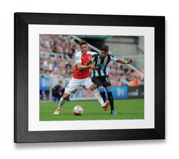 Framed Print : Clash at St. James Park: A Battle Between Olivier Giroud and Ayoze Perez