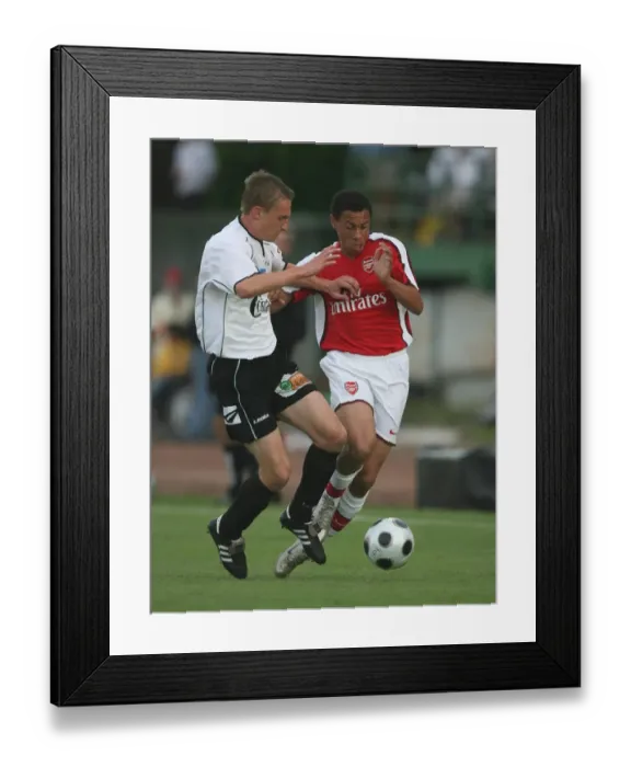 Framed Print : Francis Coquelin (Arsenal) Richard Guzmics (Szombathely)