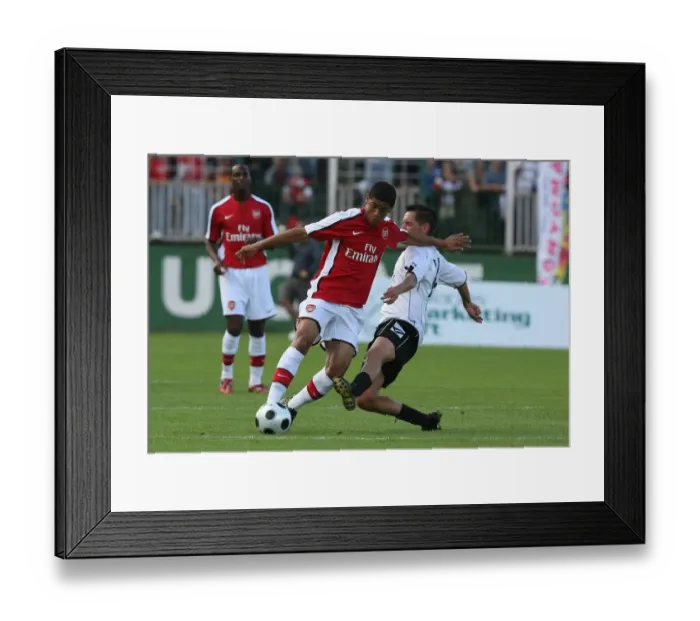 Framed Print : Denilson (Arsenal) Peter Voros (Szombathely) Framed Print : Denilson (Arsenal) Peter Voros (Szombathely)