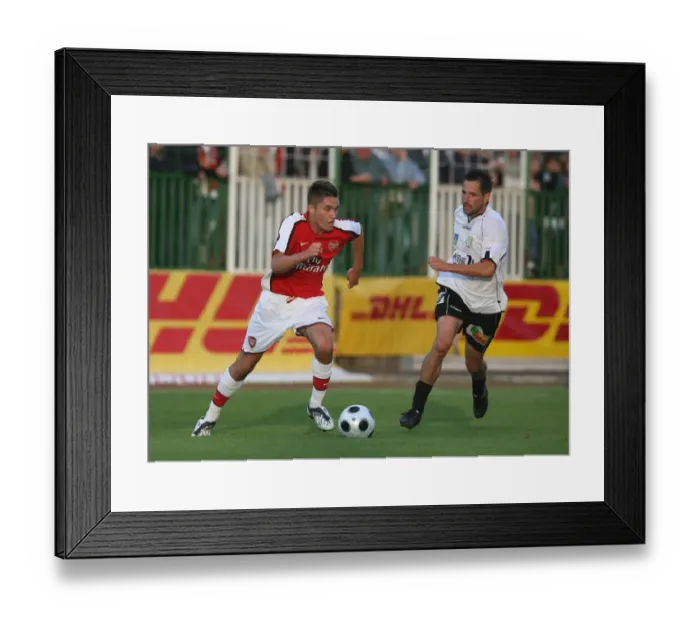 Framed Print : Henri Lansbury (Arsenal) Peter Voros (Szombathely)