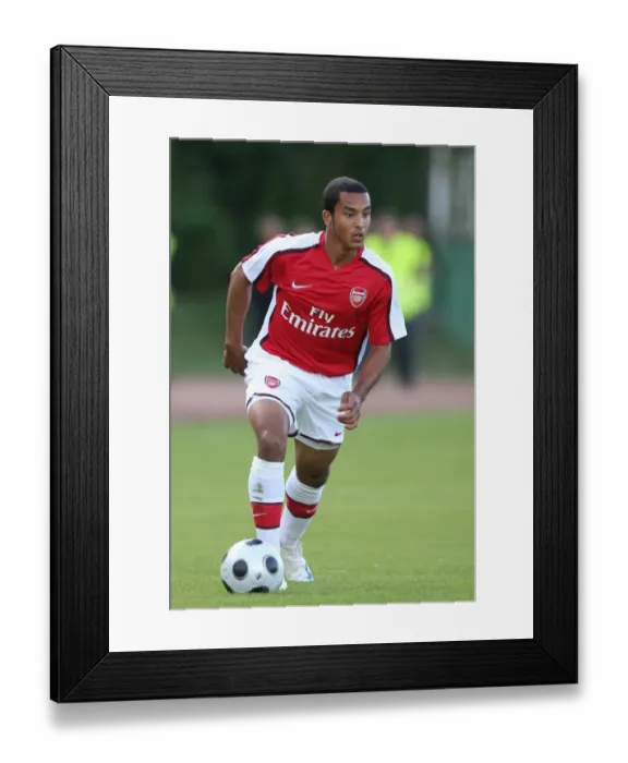 Framed Print : Theo Walcott's Battle: Arsenal vs Szombathely, 2008 - A 1-1 Draw