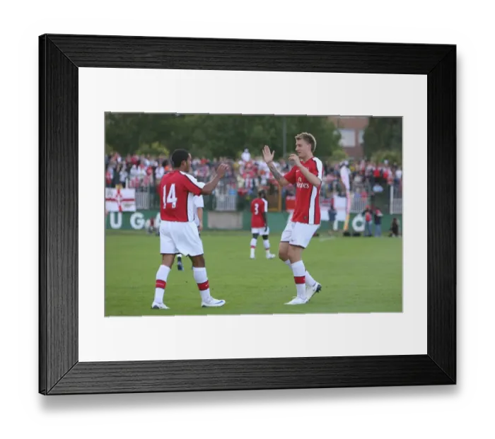 Framed Print : Theo Walcott celebrates scoring the Arsenal goal with Framed Print : Theo Walcott celebrates scoring the Arsenal goal with