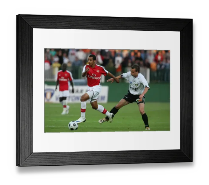 Framed Print : Theo Walcott (Arsenal) Zsolt Kovacs (Szombathely)