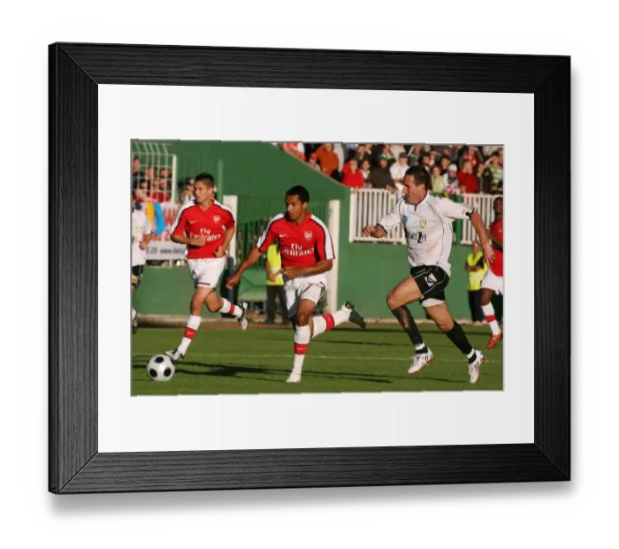 Framed Print : Theo Walcott (Arsenal) Balazs Molnar (Szombathely)