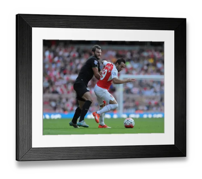 Framed Print : Clash of Midfielders: Santi Cazorla vs. Erik Pieters in Arsenal vs. Stoke Premier League Showdown Framed Print : Clash of Midfielders: Santi Cazorla vs. Erik Pieters in Arsenal vs. Stoke Premier League Showdown