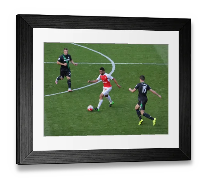 Framed Print : Coquelin Stands Firm Against Shaqiri and van Ginkel's Challenge in Arsenal vs Stoke Clash Framed Print : Coquelin Stands Firm Against Shaqiri and van Ginkel's Challenge in Arsenal vs Stoke Clash