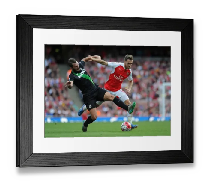 Framed Print : Intense Showdown: Ramsey vs. Pieters in Arsenal's Battle Against Stoke Framed Print : Intense Showdown: Ramsey vs. Pieters in Arsenal's Battle Against Stoke