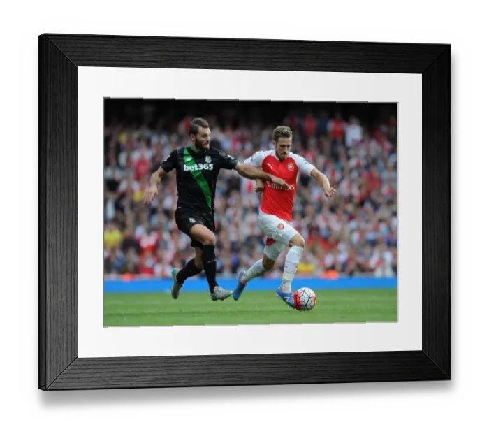 Framed Print : Head-to-Head: Ramsey vs Pieters in Intense Arsenal vs Stoke Clash Framed Print : Head-to-Head: Ramsey vs Pieters in Intense Arsenal vs Stoke Clash