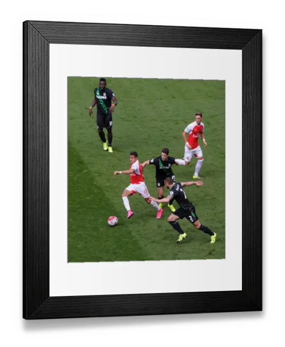 Framed Print : Arsenal's Sanchez and Ozil Go Head-to-Head with Stoke's Van Ginkel and Diouf Framed Print : Arsenal's Sanchez and Ozil Go Head-to-Head with Stoke's Van Ginkel and Diouf