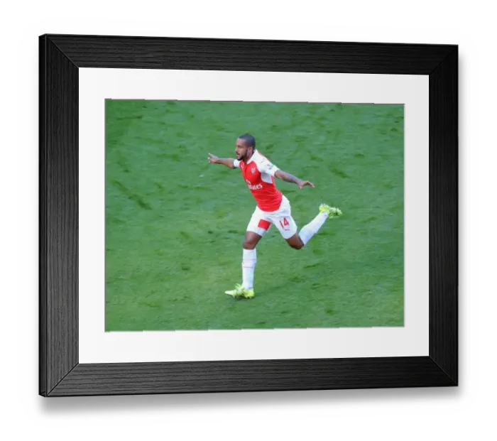 Framed Print : Theo Walcott celebrates scoring Arsenals 1st goal Framed Print : Theo Walcott celebrates scoring Arsenals 1st goal