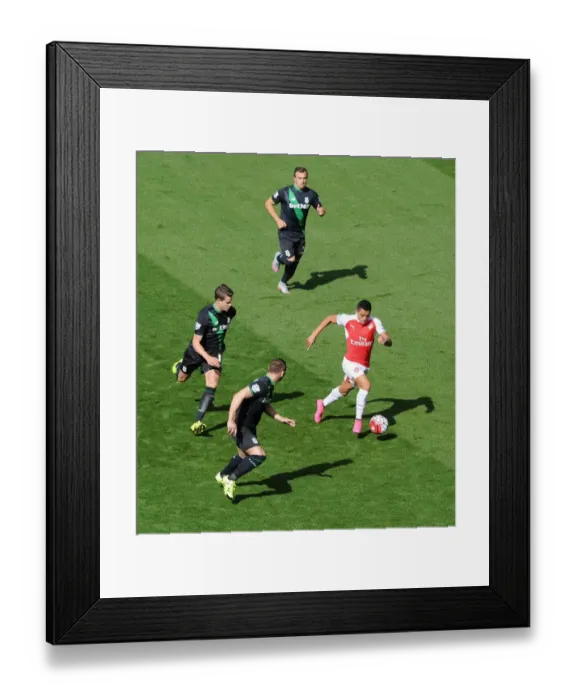 Framed Print : Alexis Sanchez (Arsenal) takes on Xherdan Shaqiri, Marco van Ginkel and Phil Bardsley Framed Print : Alexis Sanchez (Arsenal) takes on Xherdan Shaqiri, Marco van Ginkel and Phil Bardsley