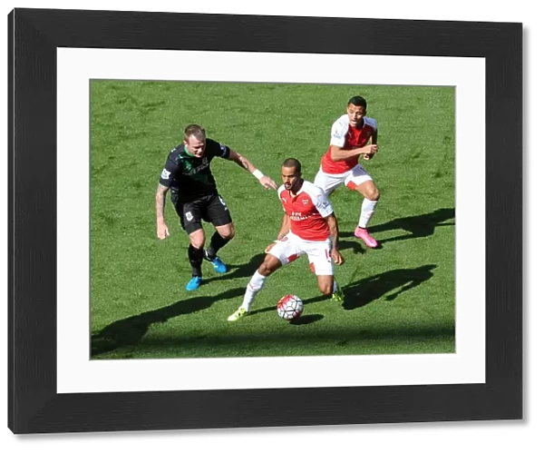 Theo Walcott and Alexis Sanchez (Arsenal) Glen Whelan (Stoke). Arsenal 2: 0 Stoke City