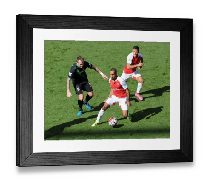 Framed Print : Theo Walcott and Alexis Sanchez (Arsenal) Glen Whelan (Stoke). Arsenal 2: 0 Stoke City
