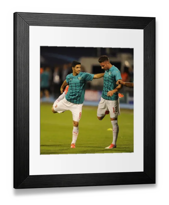 Framed Print : Mikel Arteta and Olivier Giroud Preparing for Arsenal's UEFA Champions League Clash against Dinamo Zagreb, 2015