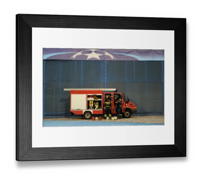 Framed Print : Arsenal's Unusual Pre-Match Encounter with a Fire Truck at Dinamo Zagreb's Maksimir Stadium Framed Print : Arsenal's Unusual Pre-Match Encounter with a Fire Truck at Dinamo Zagreb's Maksimir Stadium