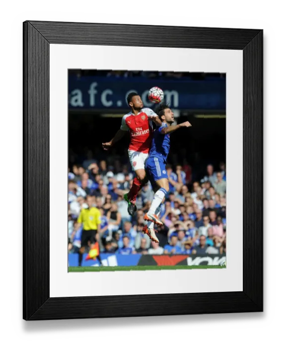 Framed Print : Coquelin vs. Fabregas: A Battle for London Derby Supremacy Framed Print : Coquelin vs. Fabregas: A Battle for London Derby Supremacy
