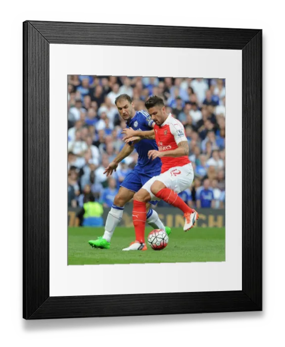 Framed Print : Giroud vs Ivanovic: A Rivalry Moment in the Chelsea vs Arsenal Clash (2015-16)