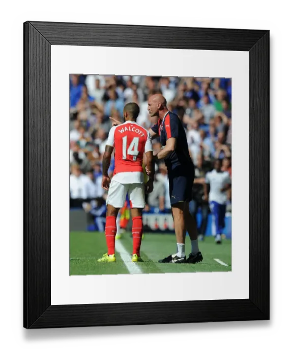 Framed Print : Steve Bould Coaches Theo Walcott: Arsenal's Assistant Manager Gives Instructions During Chelsea vs. Arsenal (2015-16 Premier League) Framed Print : Steve Bould Coaches Theo Walcott: Arsenal's Assistant Manager Gives Instructions During Chelsea vs. Arsenal (2015-16 Premier League)