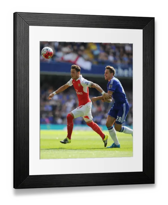 Framed Print : Mesut Ozil vs Cesar Azpilicueta: A Premier League Showdown at the Emirates Framed Print : Mesut Ozil vs Cesar Azpilicueta: A Premier League Showdown at the Emirates