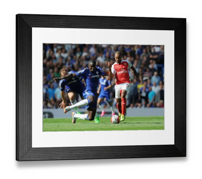 Framed Print : Theo Walcott vs Kurt Zouma: A Football Battle at the Heart of the Chelsea vs Arsenal Rivalry (2015-16) Framed Print : Theo Walcott vs Kurt Zouma: A Football Battle at the Heart of the Chelsea vs Arsenal Rivalry (2015-16)