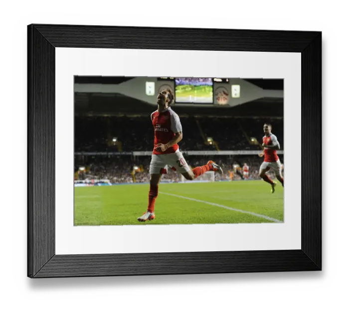 Framed Print : Flamini Scores the Winner: Arsenal Triumphs over Tottenham in Capital One Cup Showdown