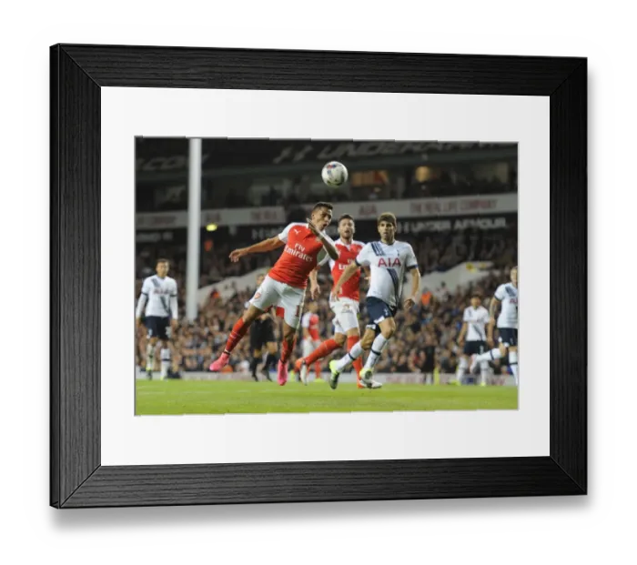 Framed Print : Alexis Sanchez vs. Tottenhotpur: Arsenal Star Faces Off in Intense Capital One Cup Clash