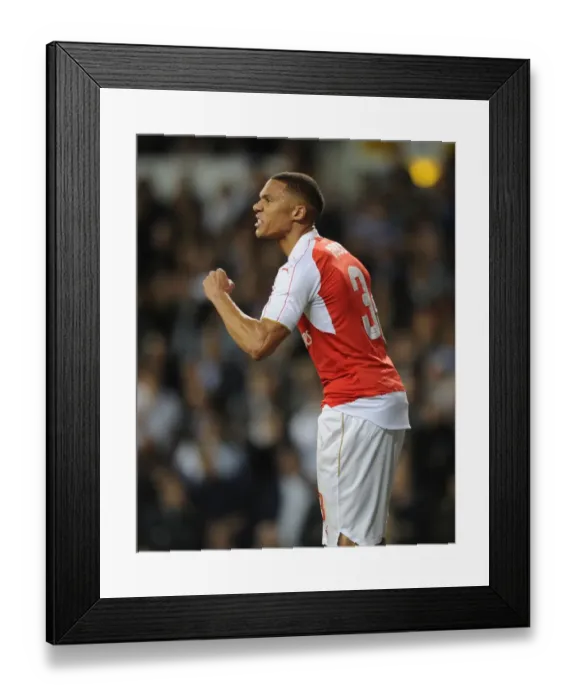 Framed Print : Arsenal's Kieran Gibbs Goes Head-to-Head with Tottenham in Capital One Cup Showdown