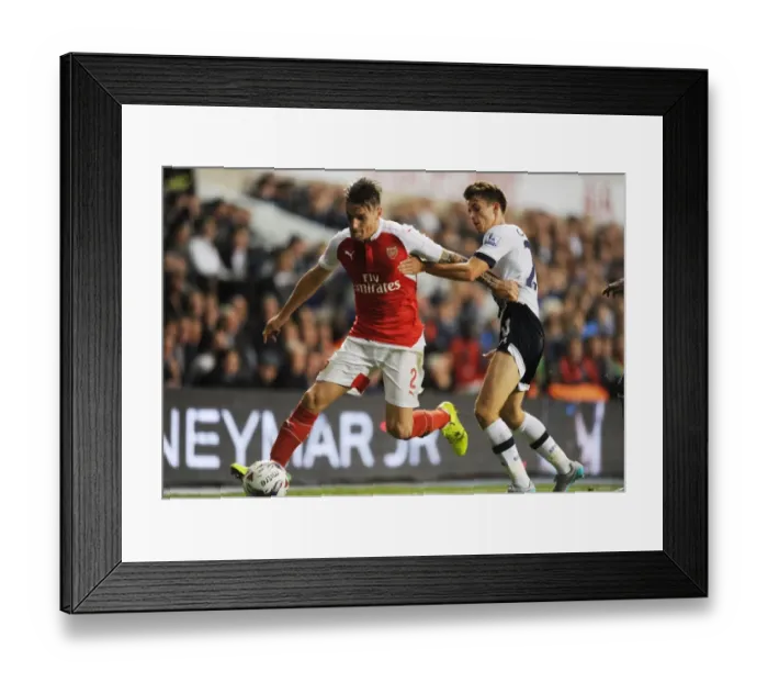 Framed Print : Clash at White Hart Lane: Debuchy vs. Carroll - Arsenal vs. Tottenham in the Capital One Cup Framed Print : Clash at White Hart Lane: Debuchy vs. Carroll - Arsenal vs. Tottenham in the Capital One Cup