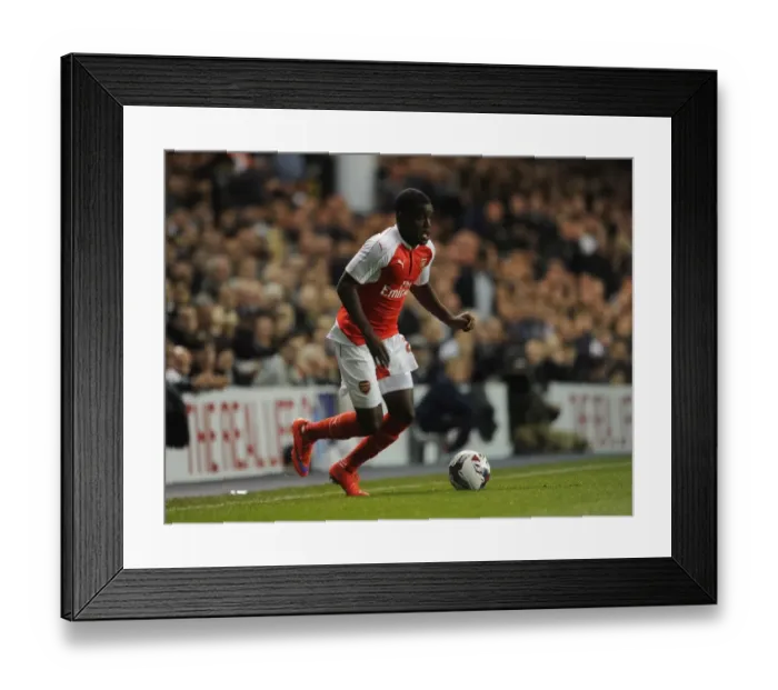 Framed Print : Joel Campbell's Showdown: Arsenal vs. Tottenham in Capital One Cup Clash