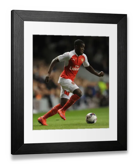 Framed Print : Joel Campbell's Showdown: Tottenham vs. Arsenal in Capital One Cup Clash