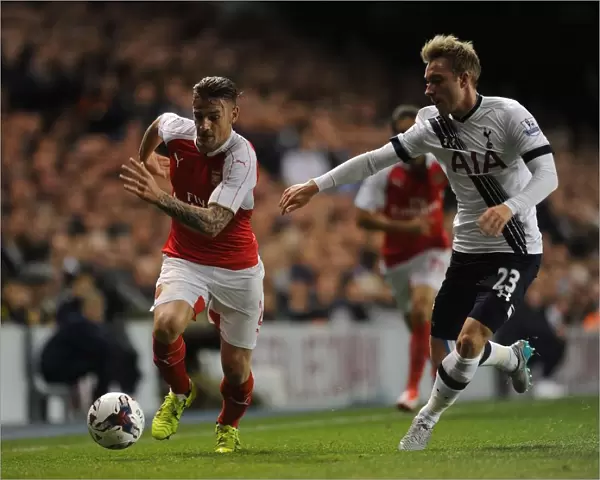 Intense Rivalry: Debuchy vs. Eriksen in the Battle of the Capital One Cup: Tottenham vs. Arsenal