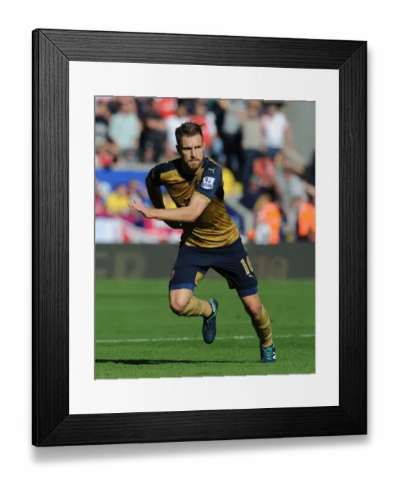 Framed Print : Arsenal's Aaron Ramsey Goes Head-to-Head with Leicester City in Premier League Showdown (2015 / 16)