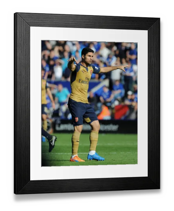 Framed Print : Mikel Arteta vs Leicester City: Intense Face-off in the 2015 / 16 Premier League
