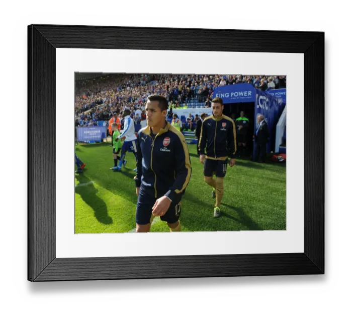 Framed Print : Arsenal Stars Alexis Sanchez and Mesut Ozil: Focused Before Leicester City Showdown (2015 / 16) Framed Print : Arsenal Stars Alexis Sanchez and Mesut Ozil: Focused Before Leicester City Showdown (2015 / 16)