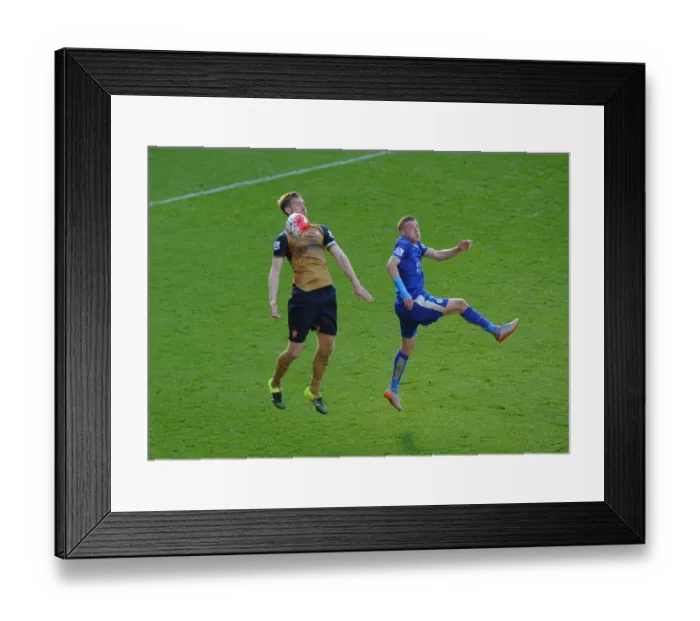 Framed Print : Per Mertesacker vs Jamie Vardy: A Footballing Battle in the Leicester City vs Arsenal Premier League Clash (September 2015)