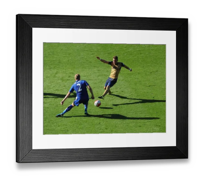 Framed Print : Mesut Ozil vs Ritchie De Laet: A Premier League Showdown Framed Print : Mesut Ozil vs Ritchie De Laet: A Premier League Showdown