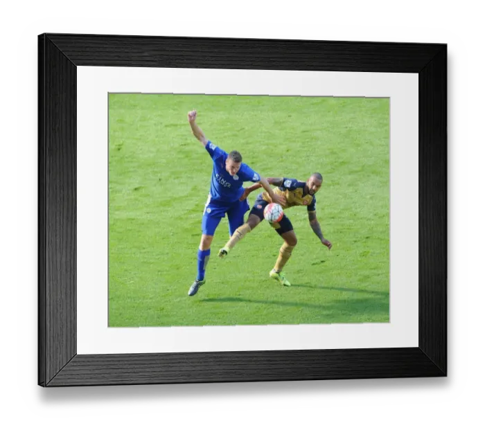 Framed Print : Theo Walcott vs. Robert Huth: A Football Battle at the King Power Stadium (2015 / 16 Premier League)