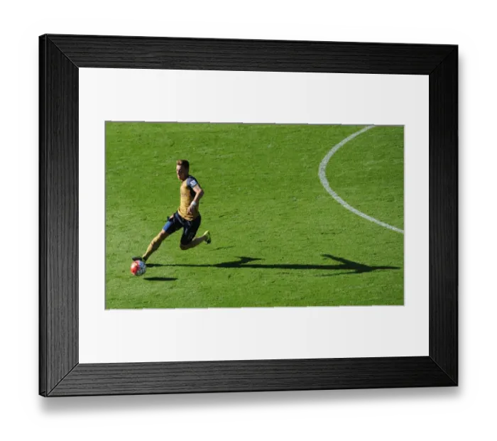 Framed Print : Arsenal's Mesut Ozil Stars: 5-2 Victory Over Leicester City in Premier League