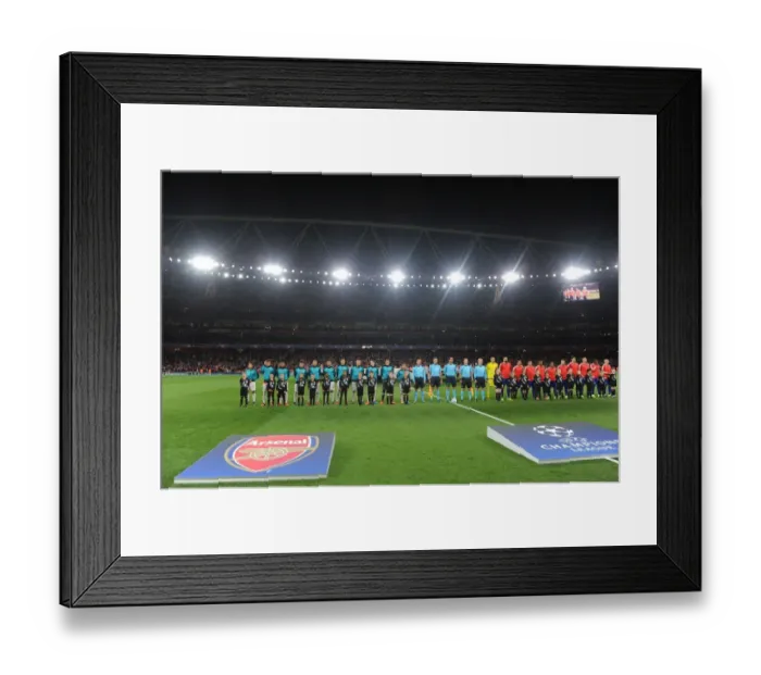 Framed Print : Arsenal vs. Olympiacos: Champions League Clash at Emirates Stadium Framed Print : Arsenal vs. Olympiacos: Champions League Clash at Emirates Stadium