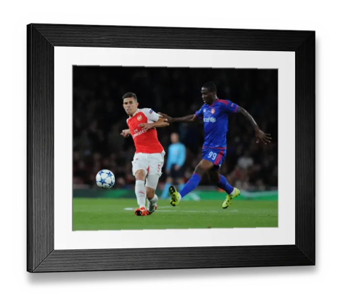 Framed Print : Arsenal vs. Olympiacos: Gabriel vs. Ideye - Champions League Clash
