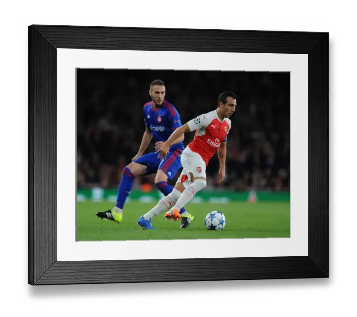 Framed Print : Arsenal's Santi Cazorla Outsmarts Olympiacos Pajtim Kasami in Thrilling 2015 / 16 Champions League Showdown