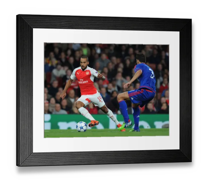 Framed Print : Theo Walcott vs. Alberto Botia: Intense Clash in Arsenal's 2015 / 16 Champions League Match